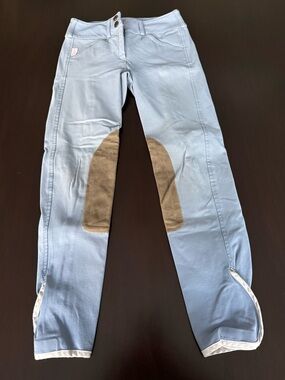 The Tailored Sportsman Light Blue Riding Breeches with Tan Knee Patches